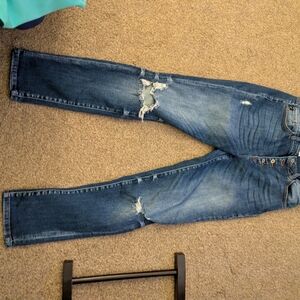 Distressed Blue Jeans
